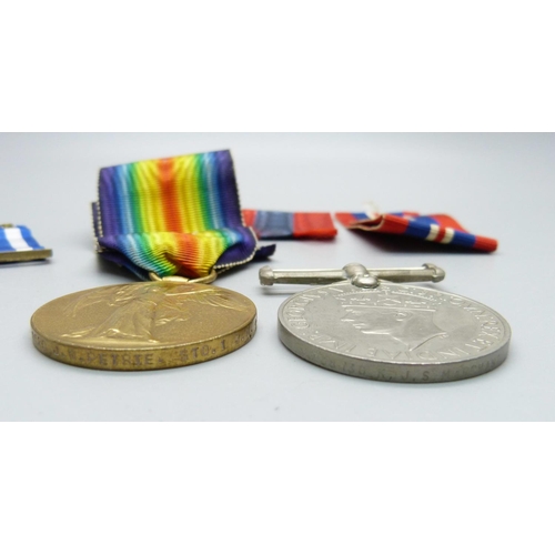 1025 - Three medals; a WWI Victory medal, K-48520 J.N. Petrie Sto. 1. R.N., a U.S. Distinguished Flying Cro... 