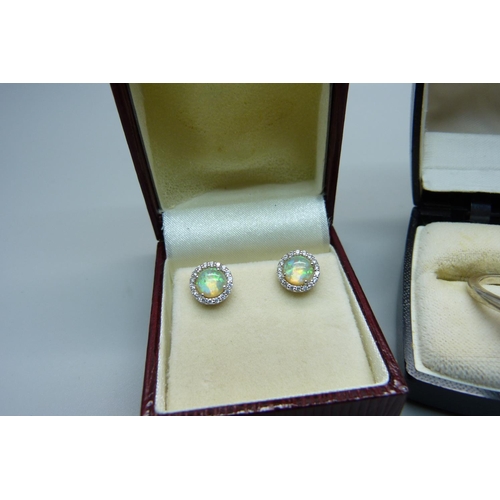 1030 - A silver and synthetic opal ring and earrings, ring size Q