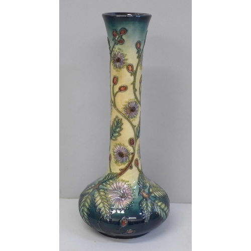 605 - A Moorcroft Fiji pattern vase, 20.5cm, no. 364, with a box