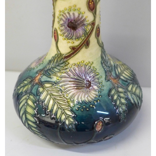 605 - A Moorcroft Fiji pattern vase, 20.5cm, no. 364, with a box