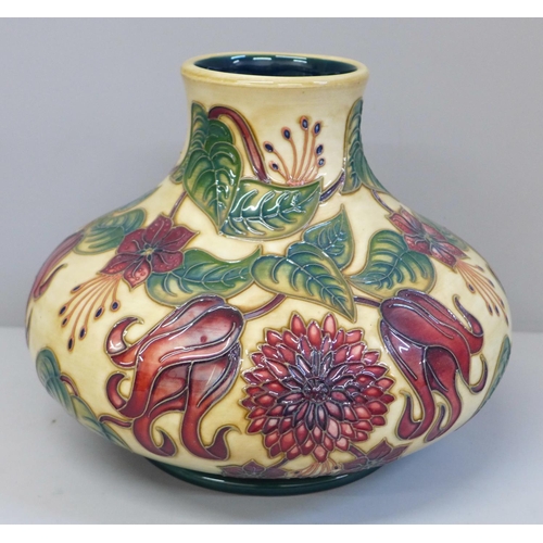 613 - A Moorcroft vase, 16.5cm, with a box