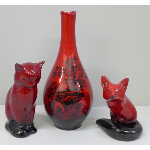 615 - A Doulton Flambe vase, fox and cat figures (3), vase 20.5cm