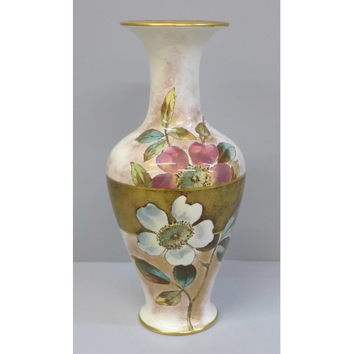 616 - A Doulton Christmas Rose faience vase, registration lozenge to base, 19.5cm