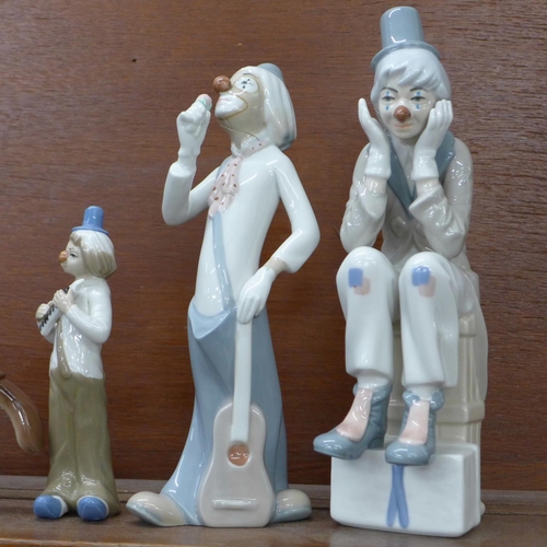 618 - Six Casades Spanish porcelain figures of clowns, one a/f and a Leonardo Collection figure of a clown