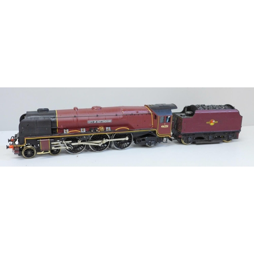 638 - A Hornby OO gauge locomotive and tender, City of Nottingham, boxed