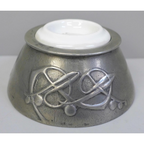 645 - An English pewter inkwell, made by Liberty, designed by Archibald Knox 0653