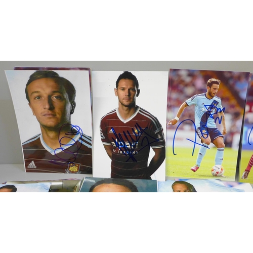 653 - Seventy-one signed photographs of West Ham United footballers, including Mark Noble (x2)