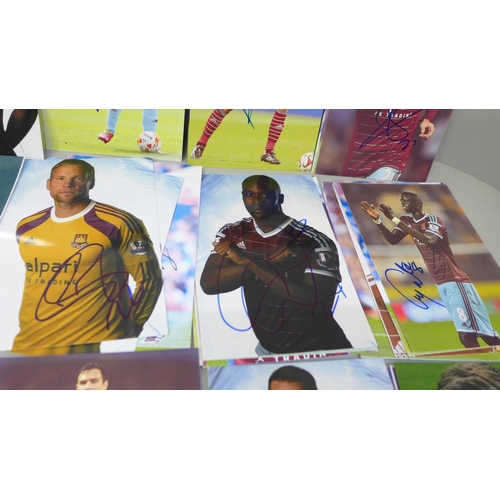 653 - Seventy-one signed photographs of West Ham United footballers, including Mark Noble (x2)