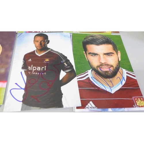 653 - Seventy-one signed photographs of West Ham United footballers, including Mark Noble (x2)