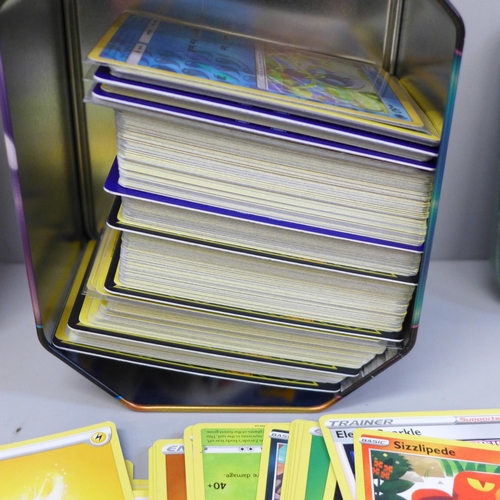 663 - Pokemon cards: mixed sets, 468 cards in three small and one medium tin