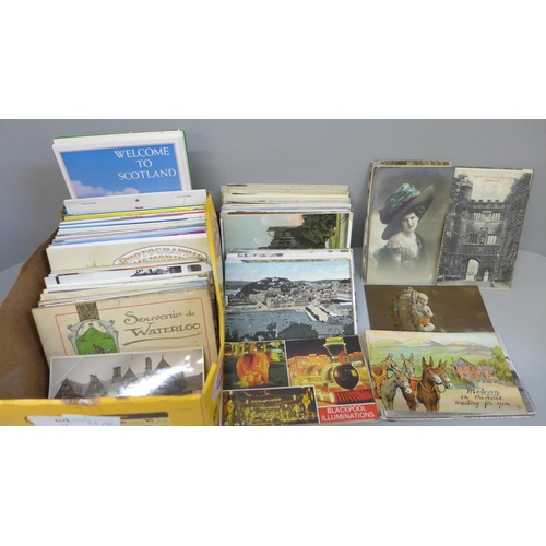 670 - Postcards; a box of postcards, vintage to modern