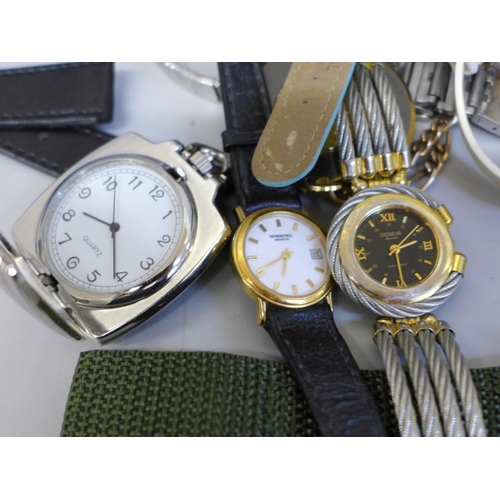 687 - A collection of wristwatches and straps