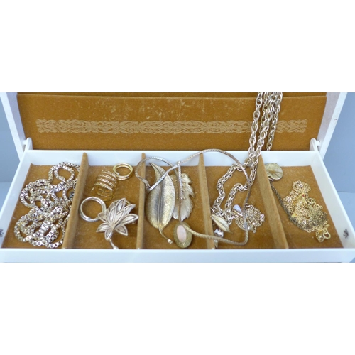 693 - A box of costume jewellery with gold tone jewellery