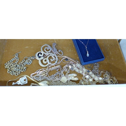 693 - A box of costume jewellery with gold tone jewellery