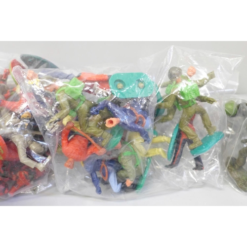 703 - A collection of plastic toy figures