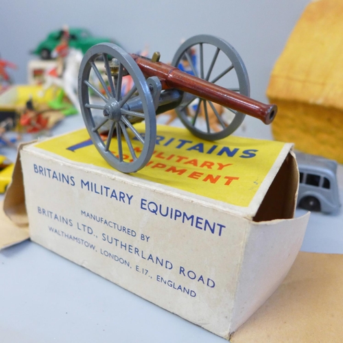 705 - A Tri-ang Minic Push and Go Lorry, a clockwork motor car, boxed, a Britain's British Artillery 2152 ... 