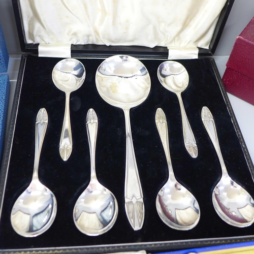 713 - A collection of silver plated cutlery and a condiment set