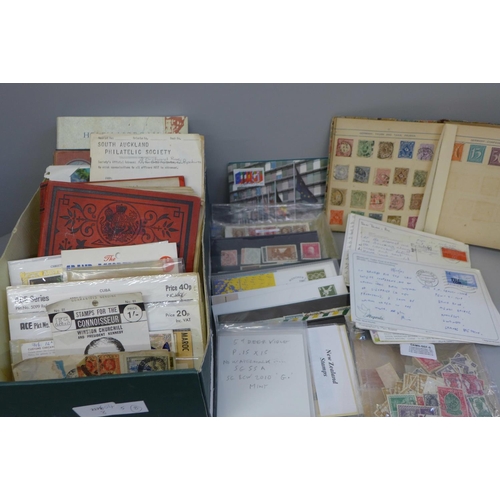 725 - Stamps; a box of stamp albums, covers, etc.