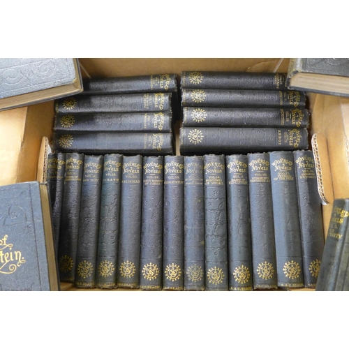 769 - Twenty-five volumes of Walter Scott The Waverley Novels, green cloth covers, embossed front and rear... 