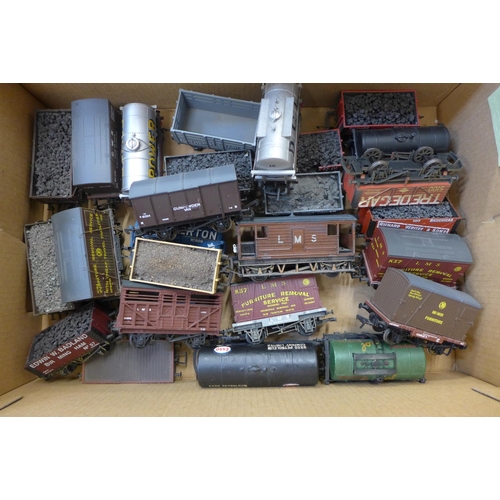 772 - A collection of over twenty-five Hornby, Bachmann OO gauge wagons and tenders