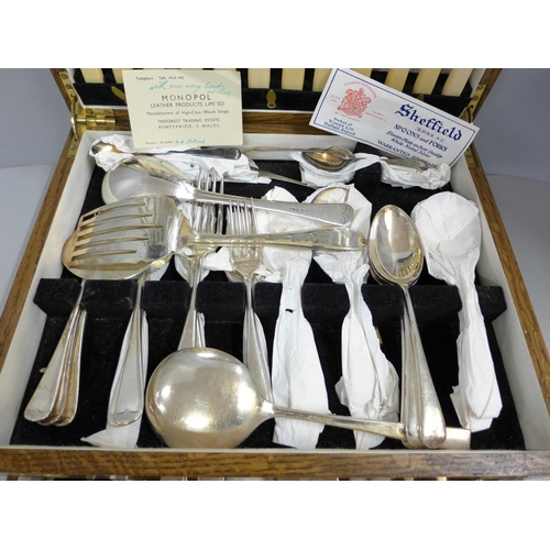 803 - A canteen of Viners Sheffield EPNS spoons and forks, fish knives and forks with ivoreen handles in a... 