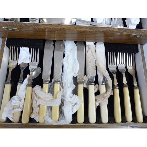 803 - A canteen of Viners Sheffield EPNS spoons and forks, fish knives and forks with ivoreen handles in a... 