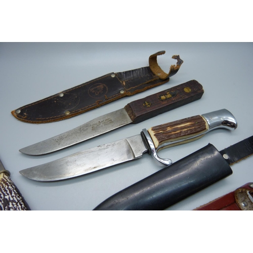 817 - Six knives including a Pradel multi-tool knife, a knife marked Girl Guides, one with Scouts emblem o... 