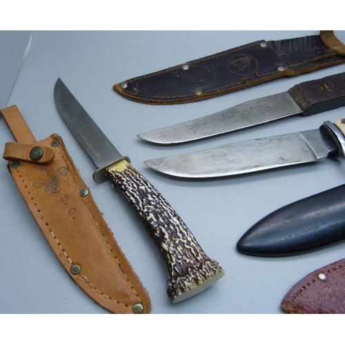 817 - Six knives including a Pradel multi-tool knife, a knife marked Girl Guides, one with Scouts emblem o... 