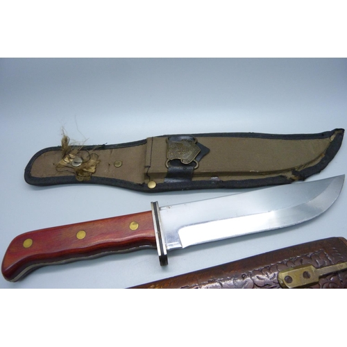 818 - Two knives, one with scabbard marked Eighth Air Force