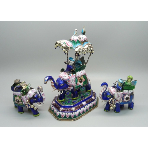 860 - A set of three silver and enamelled stone set Meenakari elephants, some enamel a/f