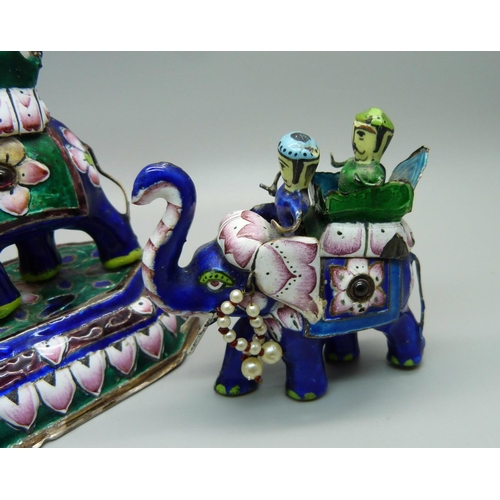 860 - A set of three silver and enamelled stone set Meenakari elephants, some enamel a/f