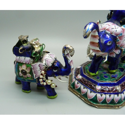 860 - A set of three silver and enamelled stone set Meenakari elephants, some enamel a/f