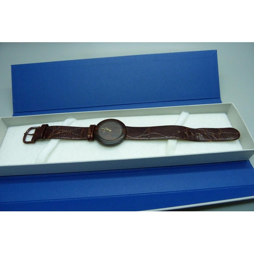 864 - A Tissot Wood watch, mid-size, on a leather strap, with box