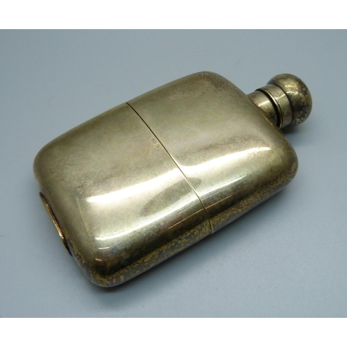 866 - A .925 silver and gilded hip flask, 188.6g