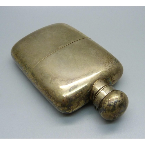 866 - A .925 silver and gilded hip flask, 188.6g