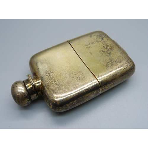 866 - A .925 silver and gilded hip flask, 188.6g