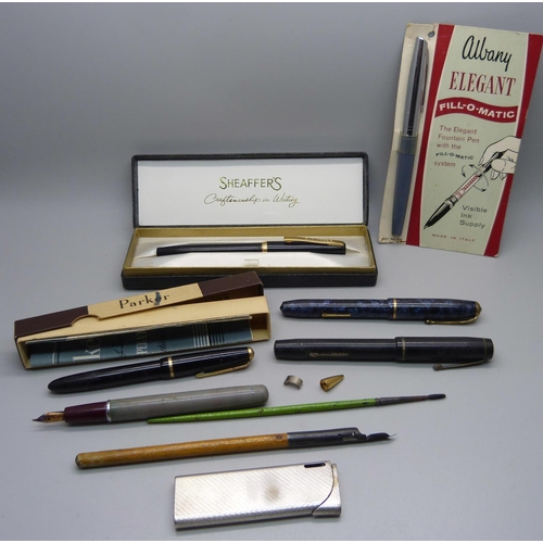 871 - A Conway Stewart 28 pen with 14ct gold nib, Sheaffer, Parker, other pens and a lighter