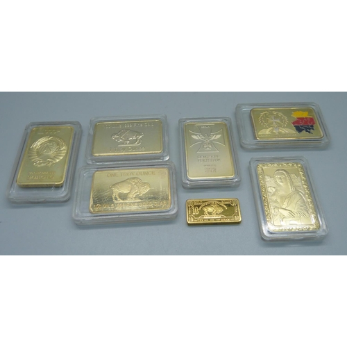 873 - Six 1oz. 999 gold clad bullion bars and one 10g bar