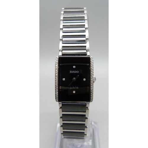 877 - A lady's Rado Jubilee diamond and stainless steel wristwatch with a ceramic strap, boxed