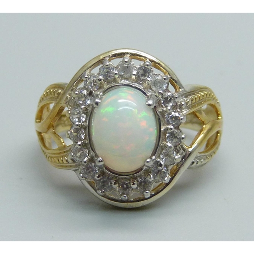 999 - A silver gilt Ethiopian opal cluster, signed D. Joy, Q