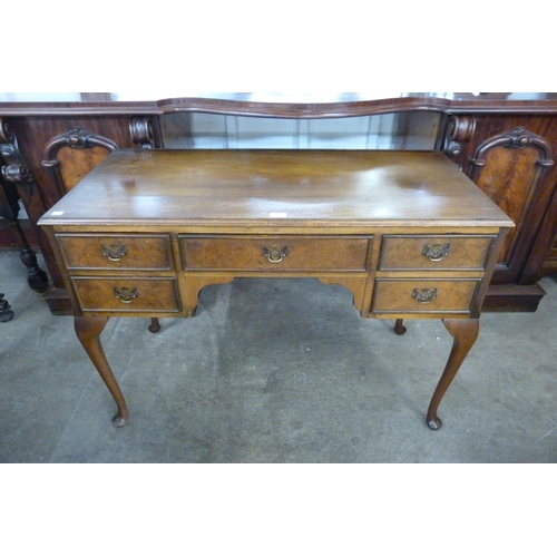 109 - A Queen Anne style walnut desk