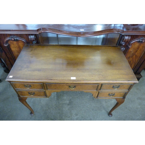 109 - A Queen Anne style walnut desk