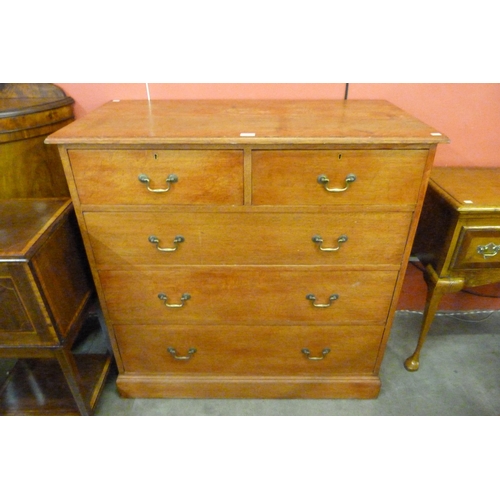 112 - An Edward VII Waring & Gillows oak chest of drawers