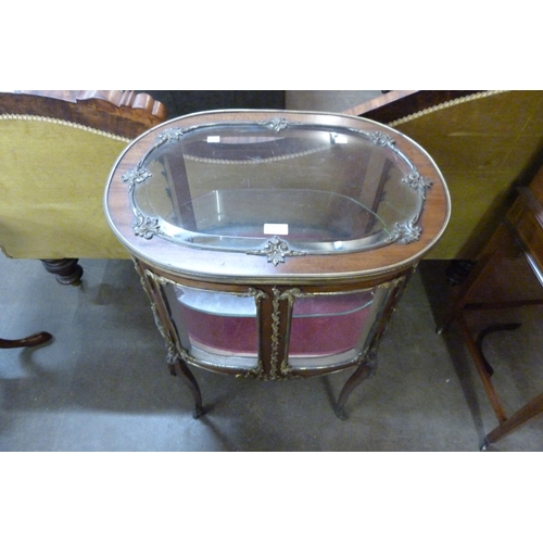 126 - A 19th Century French mahogany and gilt metal mounted bijouterie cabinet