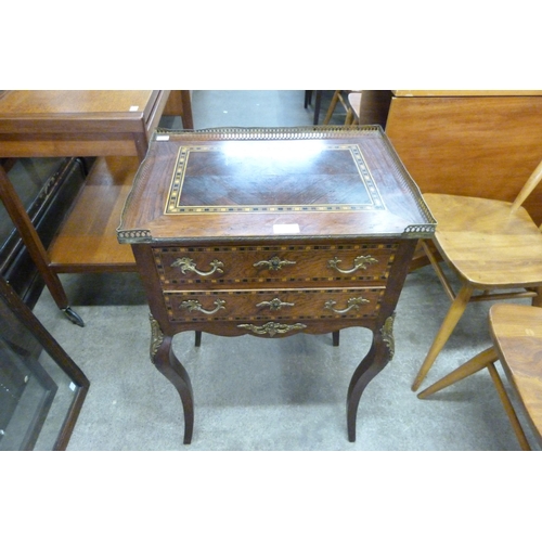 127 - A French inlaid rosewood and gilt metal mounted two drawer gueridon table