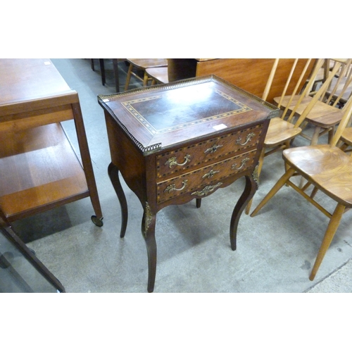 127 - A French inlaid rosewood and gilt metal mounted two drawer gueridon table