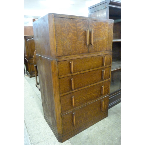 130 - An Art Deco oak tallboy