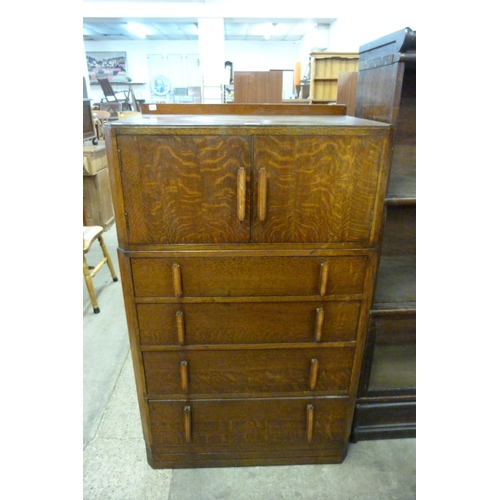 130 - An Art Deco oak tallboy