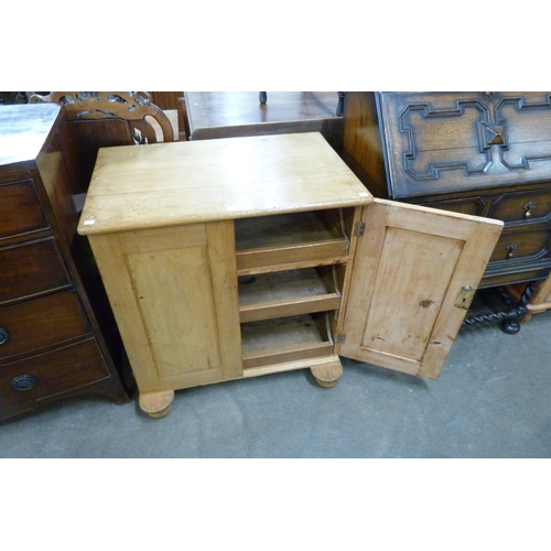 138 - A Victorian waxed pine two door fitted cupboard