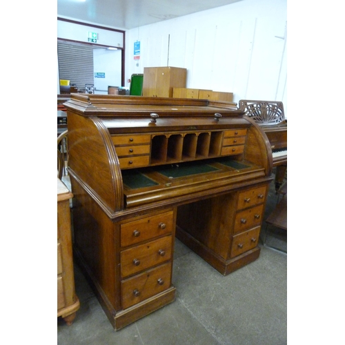 140 - A Victorian mahogany cylinder roll top desk